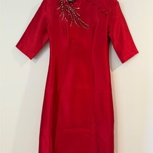 Elegant Red Dress with Embellished Neckline